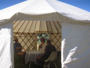 Richard, Justice and Gregory having a talk in yurt.jpg